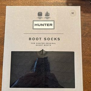 Hunter boot socks, brand new- never out of the box.  Size medium for SHORT boots